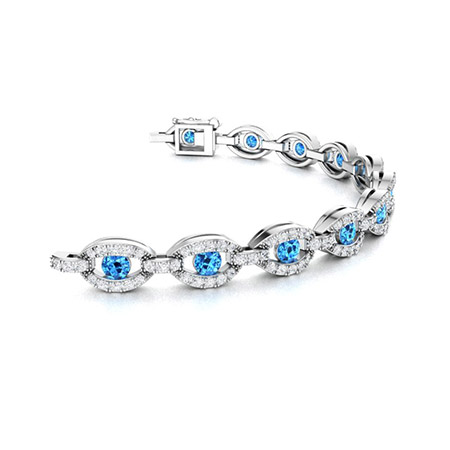 Striking Blue Topaz Ring with Sapphires | SCHMUCKTRAEUME.COM